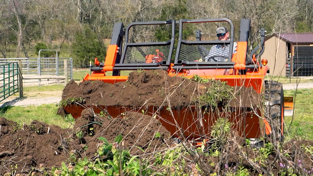 Picking up dirt with a Bucket Pro by Battle Armor Designs