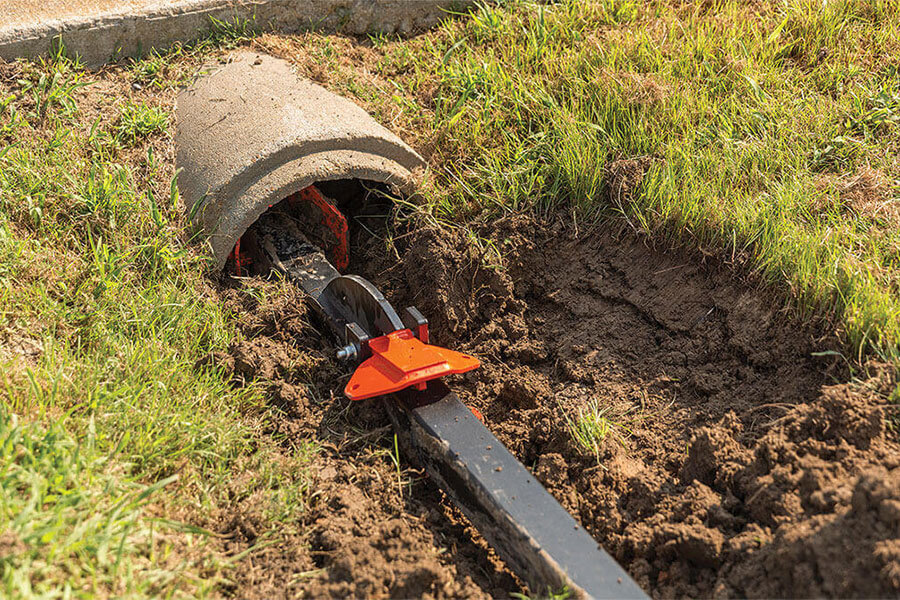 Cleaning a clogged culvert with the Culvert Cleaner