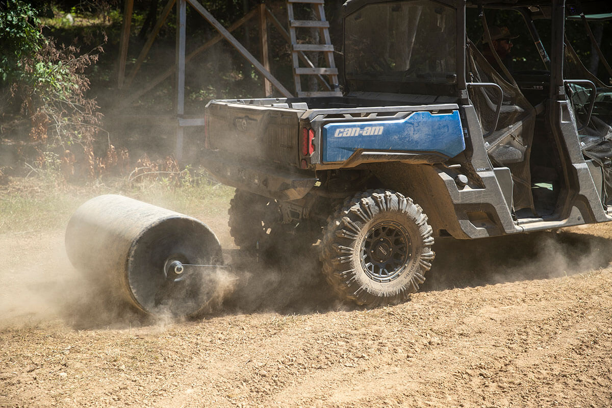 Using an Ohio Steel Roller to tamp down the newly sown food plot